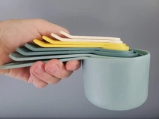 Measuring Cup Set of 8  Joseph Joseph 1/4 tsp - 1 cup Blue Yellow Cream Colors