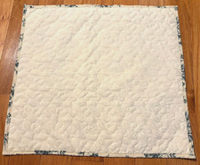 White Quilted Table Topper, liner on the back with blue flowers, 19x 18 new