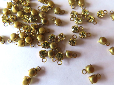 72 Swarovski Rhinestones 19ss Jonquil/1 loop brass settings.