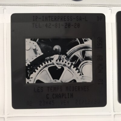 LES TEMPS MODERNE (Charlie Chaplin) - PRESS SLIDE