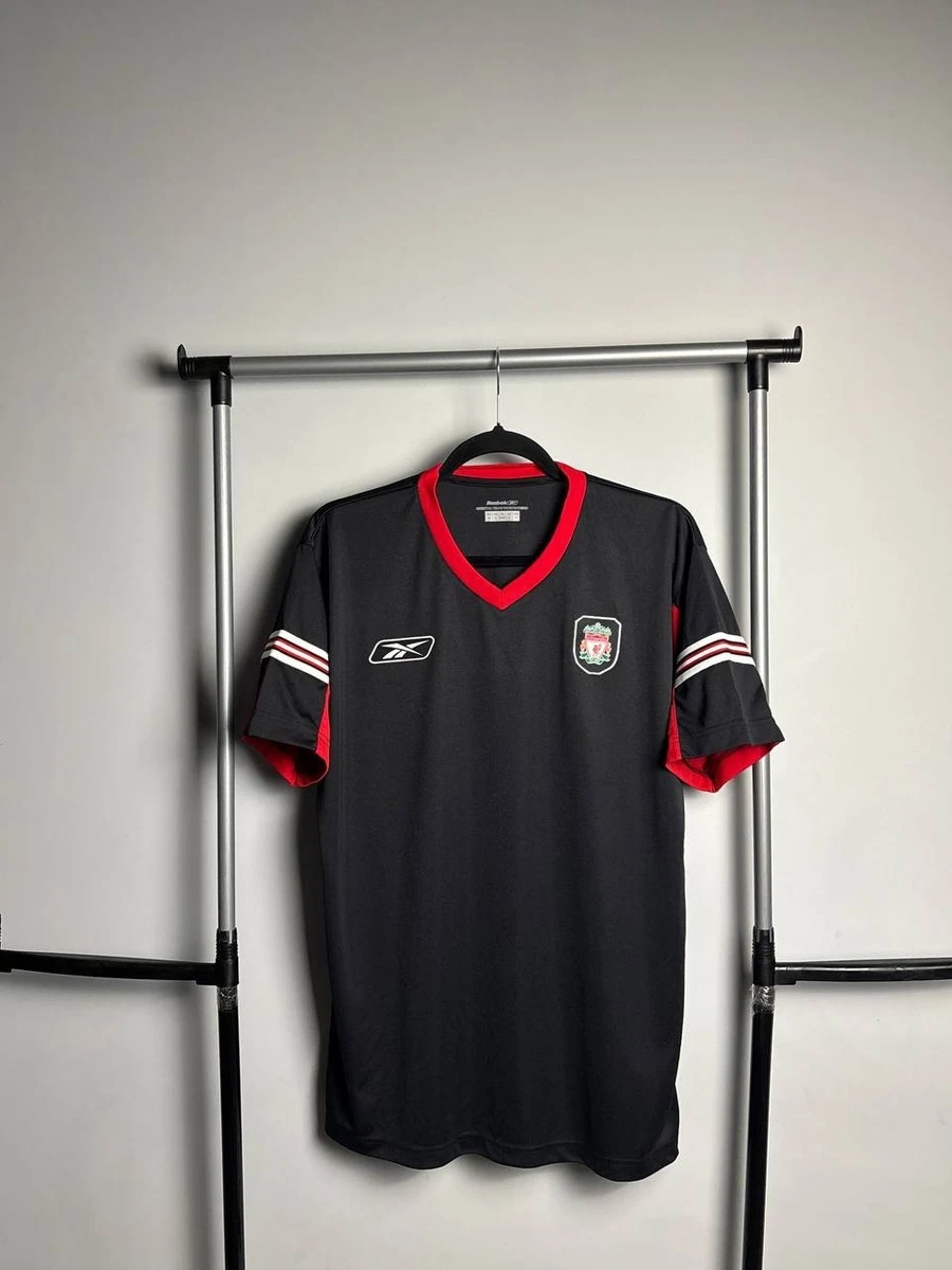 Preços baixos em Reebok Liverpool Preto Clube Internacional de