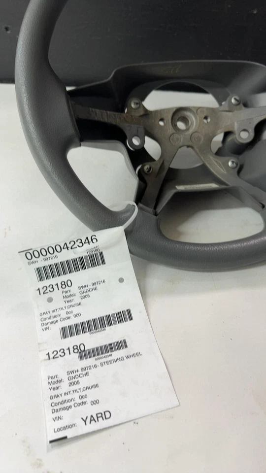 Volante Jeep Grand Cherokee 2005-07 gris crucero inclinado Foto 4 de 4