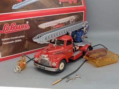 Modellautos ca. 1:24 Schuco Elektro Construction Feuerwehr 6080 MAN F8 OVP
