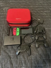 Nintendo Switch w/ Accessories Dock, Joycon,  Charger, Controller, Carrying case