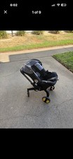 DOONA ALL IN ONE STROLLER  LATCH SEAT. Stroller And Base.