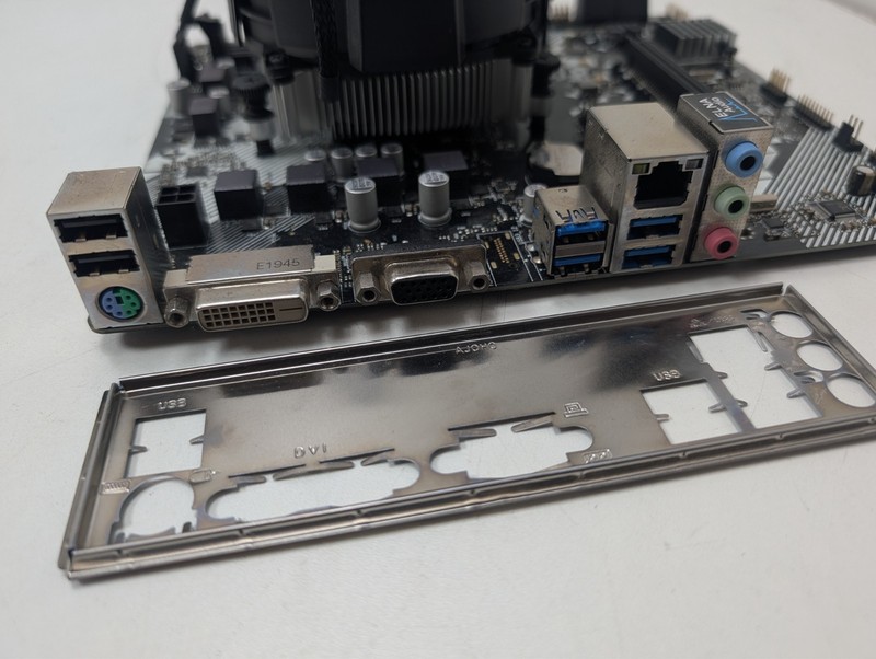 Asrock A320M-DVS Motherboard + AMD Ryzen 5 2600 + Heatsink +Backplate