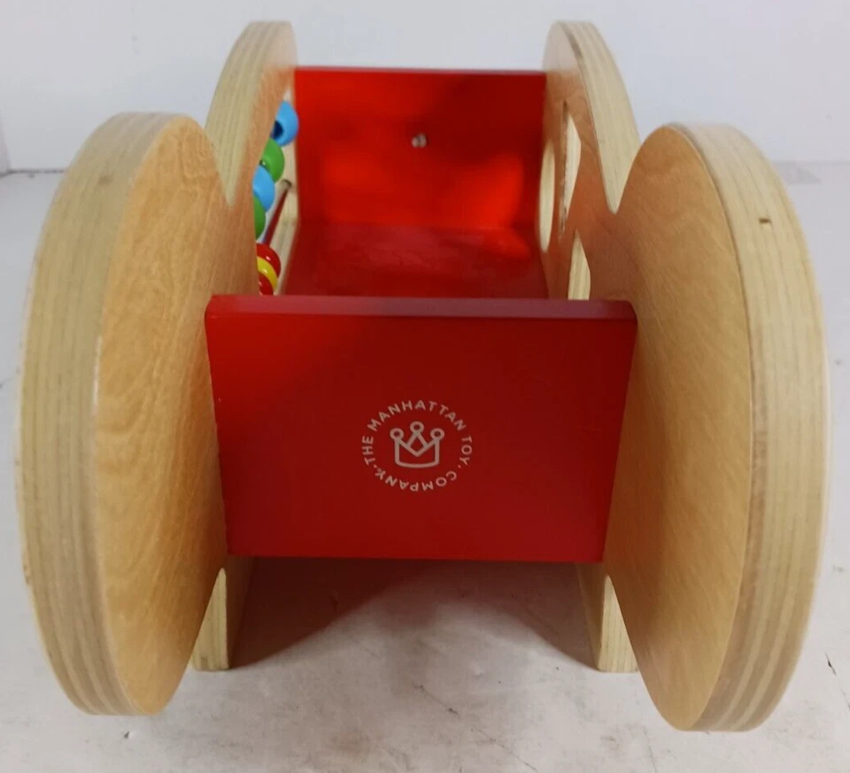 Juguete de desarrollo de perros de madera Manhattan Toy Company contando formas de colores 2019 Foto 2 de 4