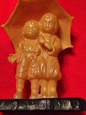 Vintage Celluloid Figurine Of Two Children Under Umbrella From 1920s To 1930s
