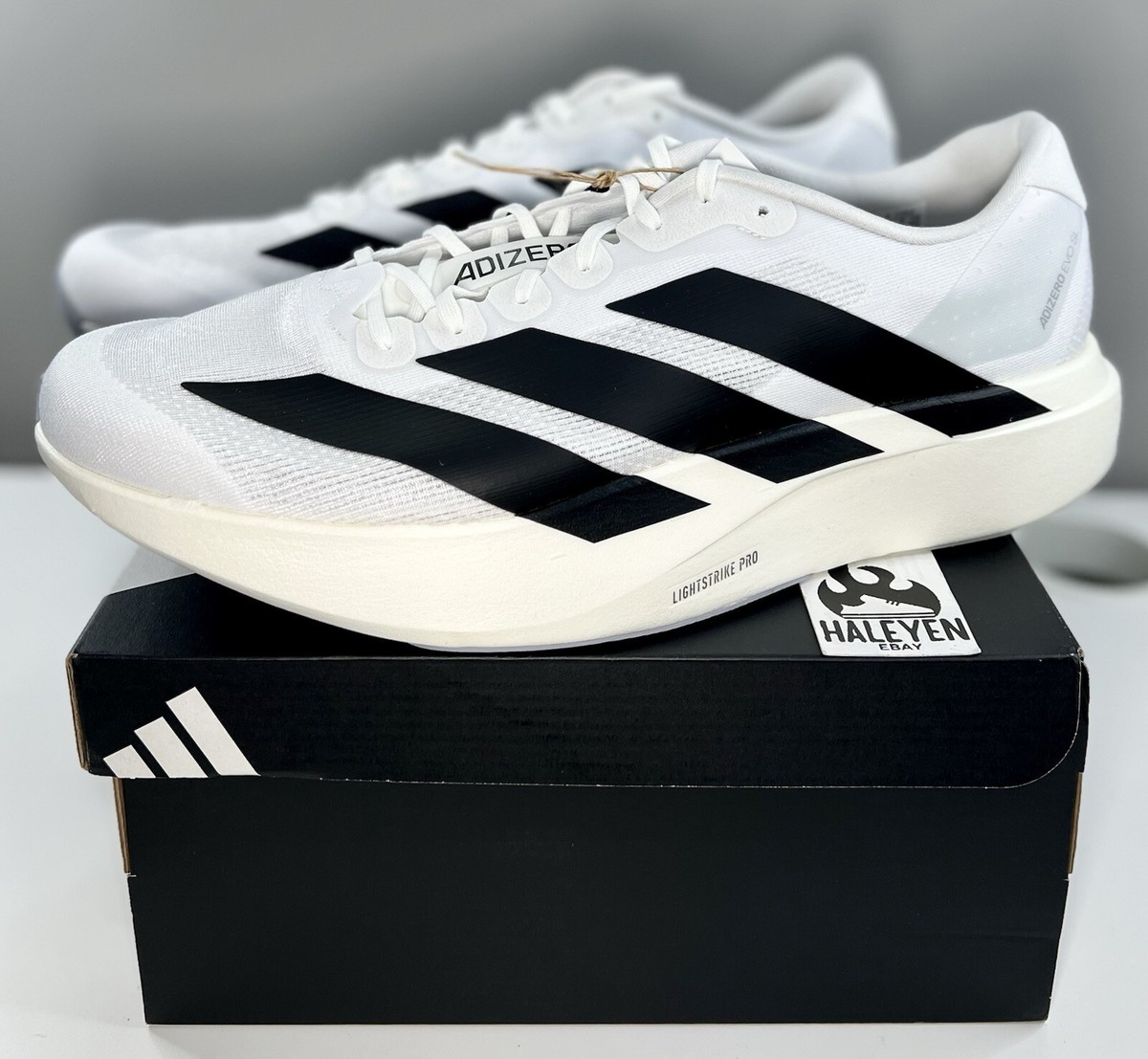 NEW adidas Adizero Evo SL White Black | Men Sizes 8 - 14 NEW adidas Adizero Evo SL White Black | Men Sizes 8 - 14