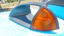95 96 97 GEO METRO FARO BISEL CONDUCTOR LADO IZQUIERDO OEM CON LÁMPARA DE ESQUINA OEM