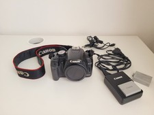 Canon EOS 500D Digital SLR Camera With a Strap And Two Batteries