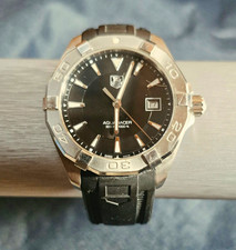TAG Heuer Aquaracer 300m Men's Black Dial Quartz Date Silver Rubber Strap