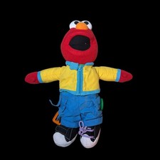 Fisher-Price Sesame Street Teach Me To Dress Elmo Talking Plush Doll