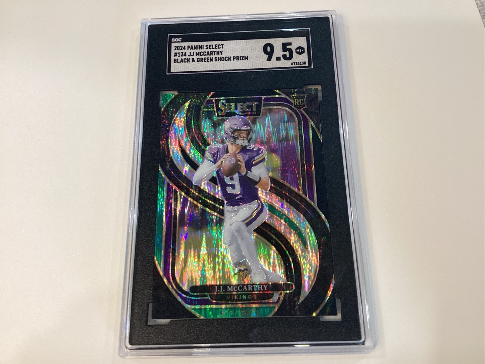2024 Panini Select - J.J. McCarthy #134 Black & Green Shock Prizm SGC 9.5 RC