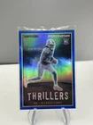 2023 Panini Rookies & Stars - Thrillers Jahmyr Gibbs #TH-11 Blue Prizm /50 (RC)