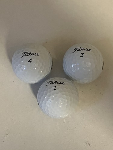 3 Used Titleist Tour Soft Golf Balls. Balls 1, 3, and 4