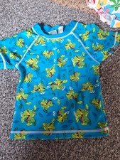 Schwimmshirt bunt Motiv: Dino /  Größe 98 von Pusblu