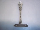 Antique sterling silver child's food pusher stamped W Wallace?   3 1/4