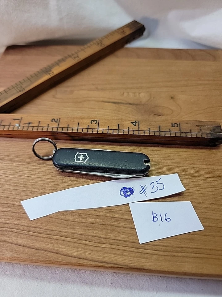 Navaja suiza clásica negra 3 funciones contiene tijeras de hoja pequeña  Foto 2 de 4