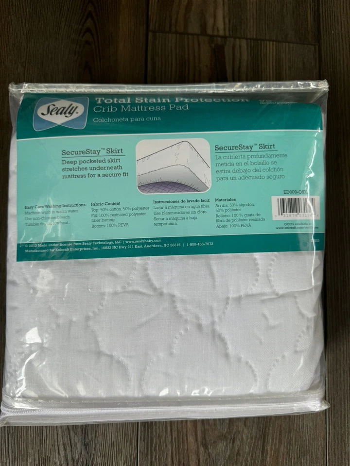 Almohadilla de colchón para cuna Sealy Total contra manchas blanca impermeable 52" x 28" Foto 2 de 4