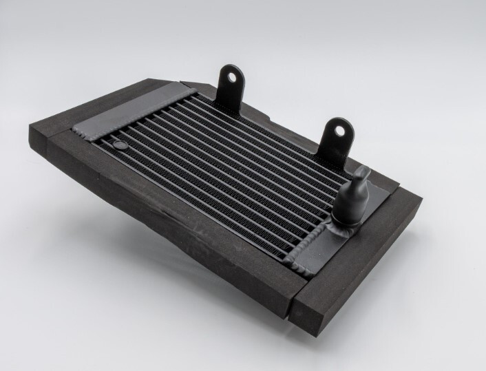 OIL COOLER RH- A120K0020F OIL COOLER RH LOTUS ORIGINAL FROM LOTUS CARS USA