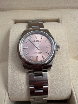 Rolex 28 mm Oyster Perpetual gently used with sought after pink starburst dial