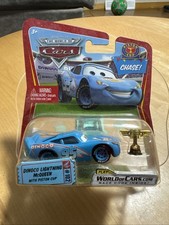 Disney Pixar CarsDinoco Lightning McQueen With Piston Cup Chase Mattel 2009