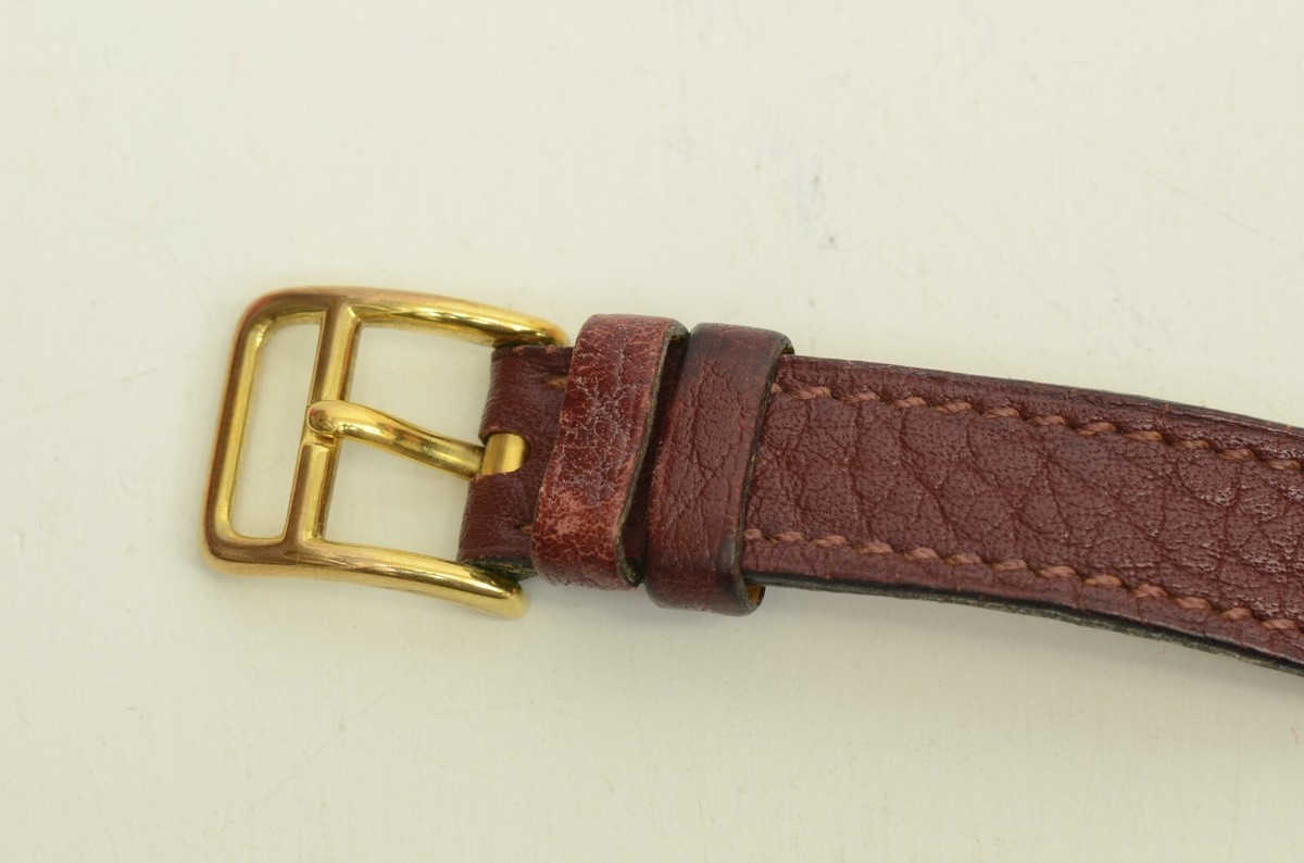 Hermes Burgundy Leather Kelly Padlock Bracelet Watch with Gold Hardware Hermès, a burgundy red leather bracelet with 14k gold plated  main image 3