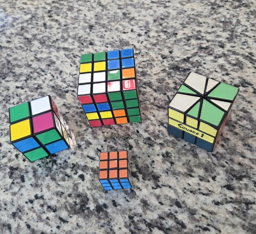 Lot of 4 Rubik's Cubes. One 2x2 , one 3x3 mini, one 4x4 and Square 1 ...