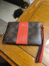 Coach Corner Zip Wristlet Signature PVC/LEATHER. Mocha/Red. New.