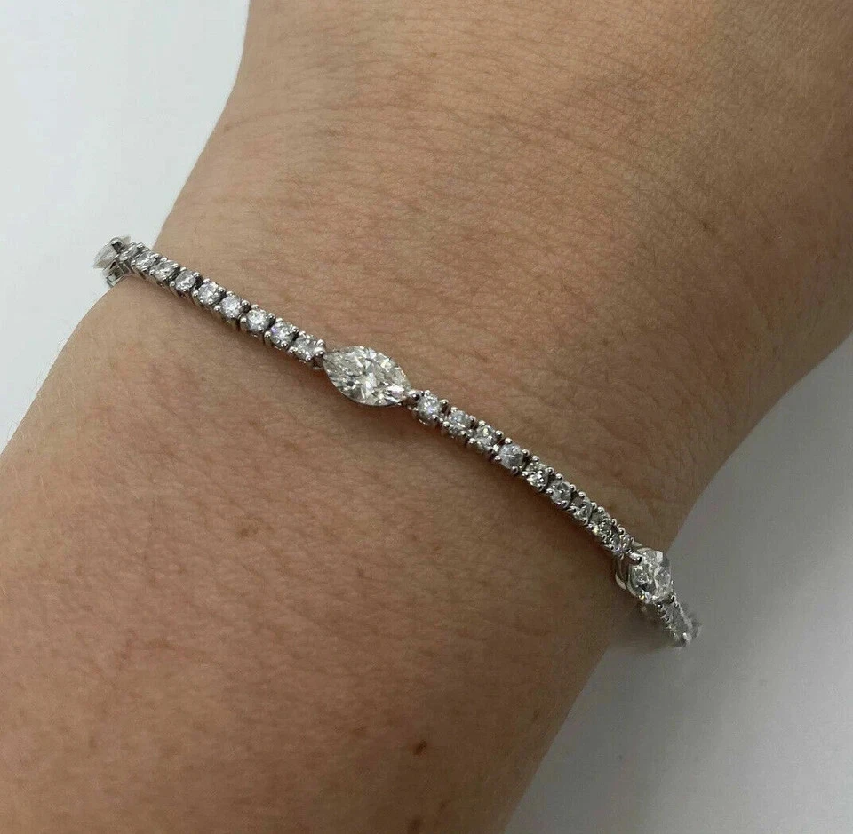 Brazalete de tenis para mujer de diamantes simulados de corte marquesa de 7 quilates enchapado en oro blanco de 14 k Foto 4 de 4