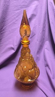 Vintage Empoli Amber Glass Genie Bottle With Fruit Motif And Stopper. 18 Inches