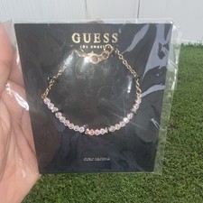 GUESS Gold Tone White Cubic Zirconia Round Li...