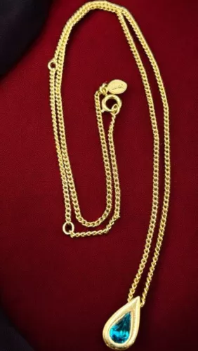 Vintage 1976 Avon Gold Tone Blue Zircon Birthstone Teardrop Pendant Necklace
