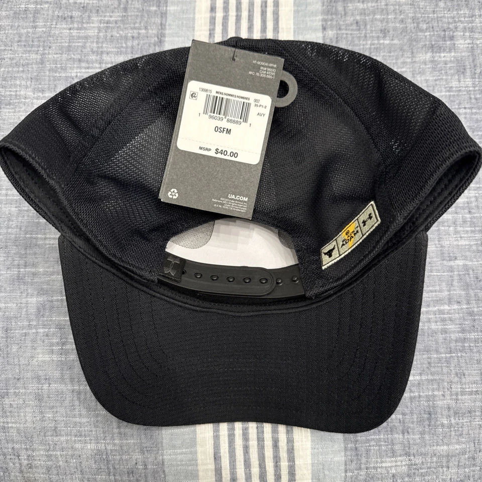 Under Armour Project Rock Negro Adam DC WB Para hombres Negro Camionero Snapback Sombrero Foto 2 de 4