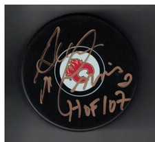Al MacINNIS CALGARY FLAMES AUTOGRAPHED HOCKEY PUCK SIGNED HOF 07 JSA AUTH