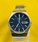 Vintage Seiko SQ Quartz 7123-840LR Day Date Gold Tone Integrated Bracelet Watch