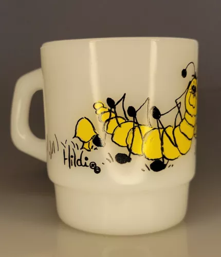 VINTAGE FIRE KING WHITE MILK GLASS HILDI MUG W/ YELLOW CATERPILLAR