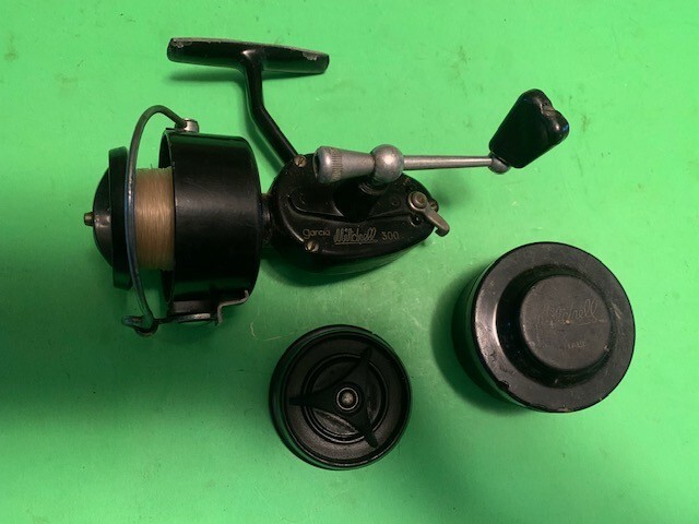 VINTAGE GARCIA MITCHELL 300 SPINNING REEL WITH AN EXTRA SPARE