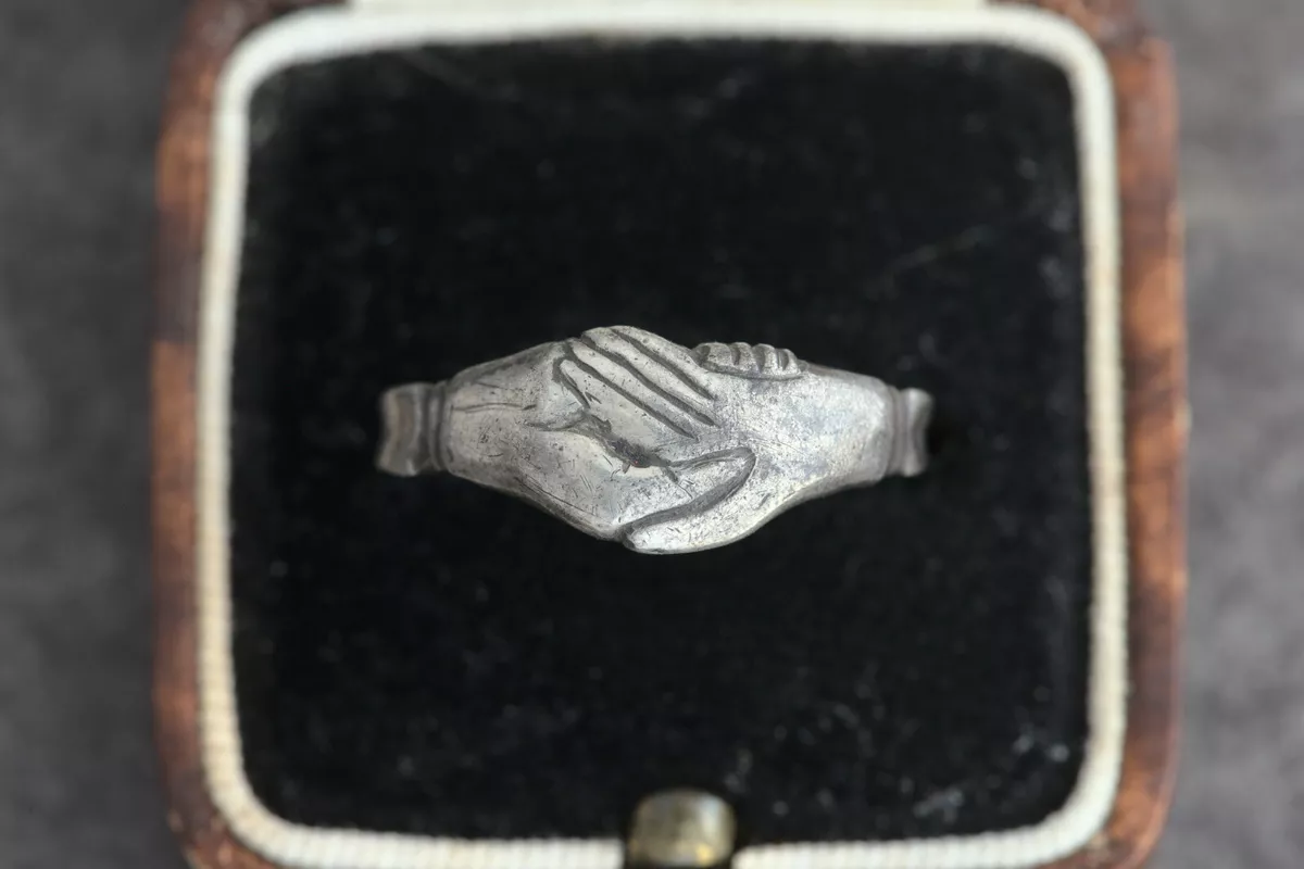 Shaking hands ring clearance