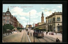 AK Karlsruhe i. B., Blick in die Kriegsstraße mit Bahnhof, Strassenbahn 1915 