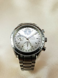 omega speedmaster automatic triple date