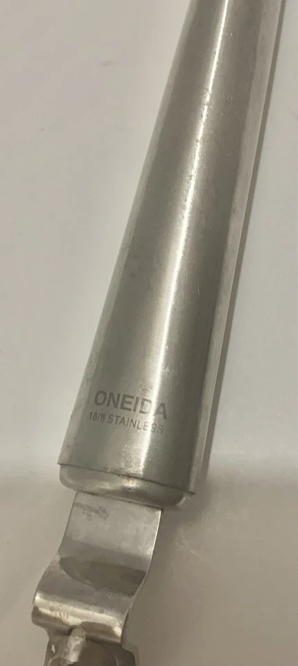 Pelador giratorio de acero inoxidable de la marca Oneida. Vintage Foto 2 de 4