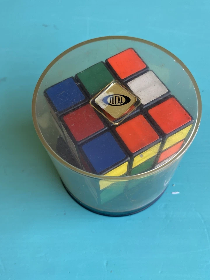 Brinquedo quebra-cabeça cubo Rubik’s vintage original dos anos 1980 na caixa com suporte - Imagem 4 de 4