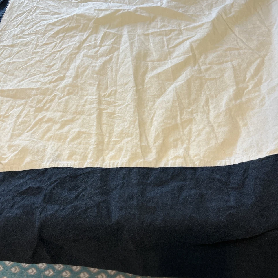 Sábana bajera y falda de cama azul liso Pottery Barn para cuna deportiva para niños Foto 2 de 4