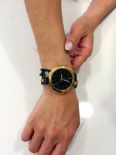 XOXO Women’s Quartz Analog Wristwatch Black Dial Gold-Tone Case Black Leather 2x