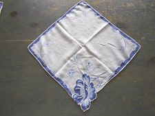 LADIES VINTAGE HANDKERCHIEF WITH LARGE BLUE FLOWER AT BOTTOM CORNER