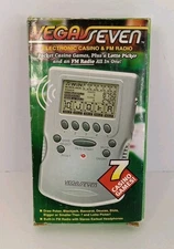 Vegas Seven Electronic Casino Handheld Game & FM Radio 7 Casino Games NEW