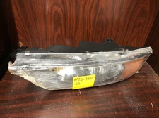 New Old Stock TYC Headlight Assembly RH (No Bulbs) Part #20-5859-01.