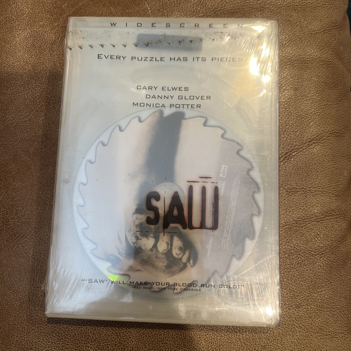 NEW Saw (DVD, 2005, Uncut Edition) LIQUID CASE CARY ELWES DANNY GLOVER NEW Saw (DVD, 2005, Uncut Edition) LIQUID CASE CARY ELWES DANNY GLOVER